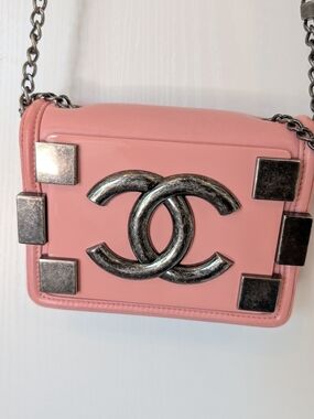 Chanel Pink Lambskin Boy Brick Flap Bag with antiqued silver hardware.